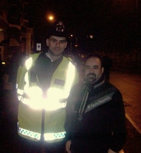 Fevzi Hussein on “spotting patrol” with a sergeant from the Metropolitan Police during the Chelsea vs. APOEL match